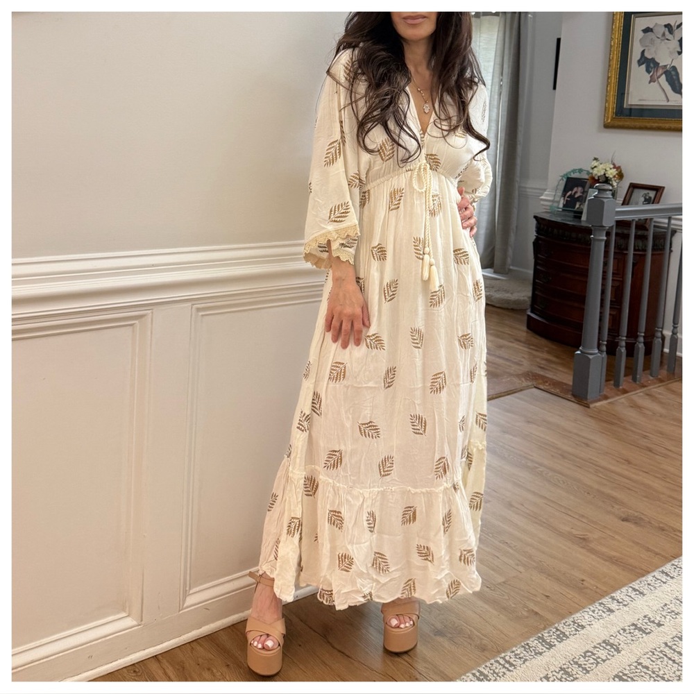 ShopEvelynne Cream Smocked Tiered Sundress